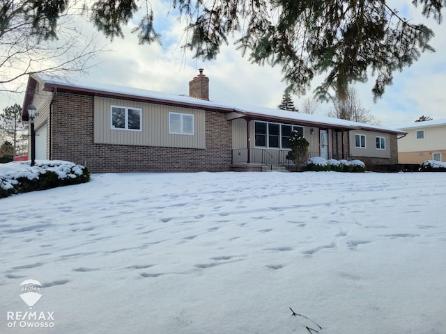 single story home featuring a garage