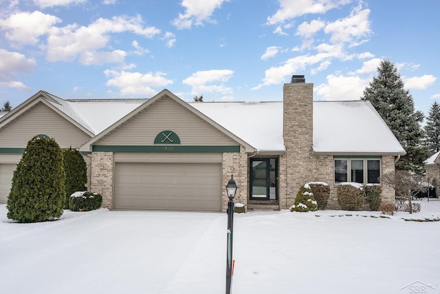 ranch-style home with a garage