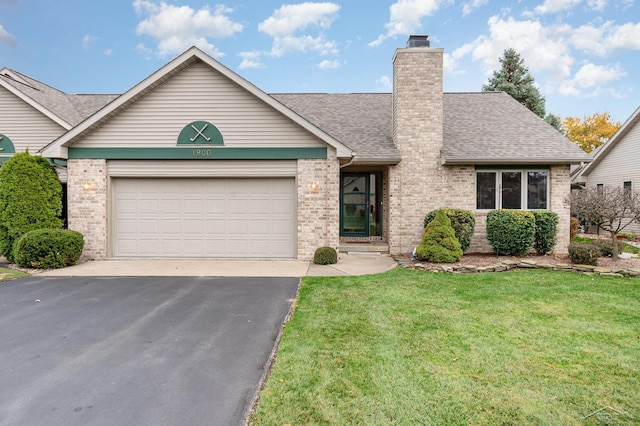 ranch-style house with a front lawn and a garage