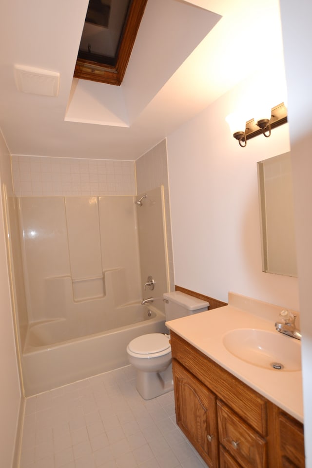 full bathroom featuring toilet, bathing tub / shower combination, tile patterned flooring, and vanity