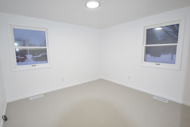 view of carpeted spare room