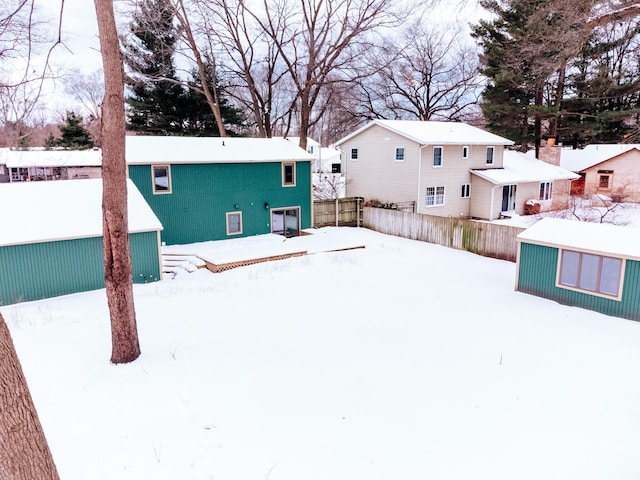 view of yard covered in snow