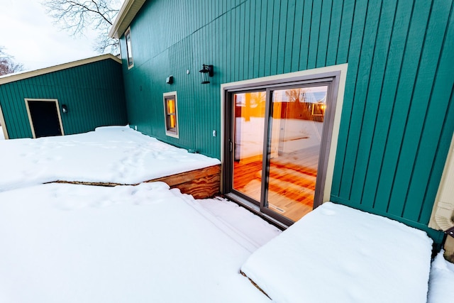 view of snow covered property