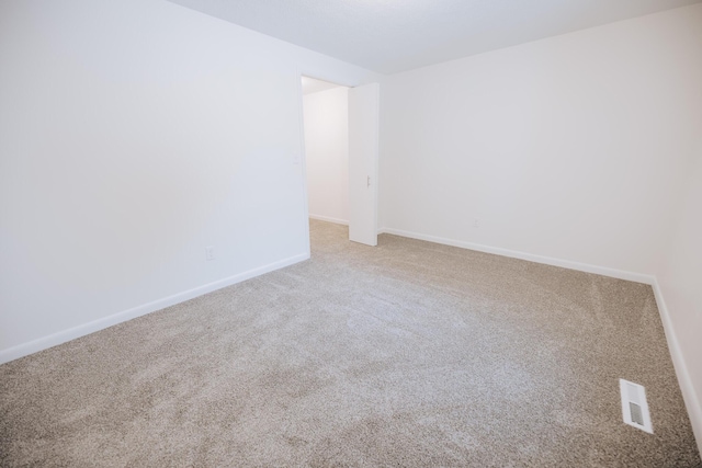 empty room featuring carpet