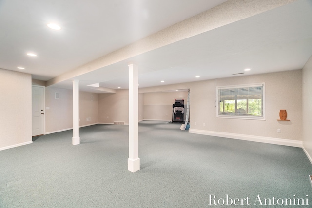 basement featuring carpet flooring