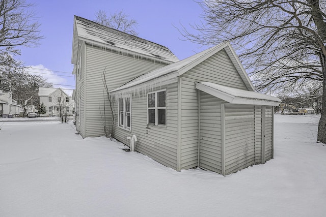 view of snow covered property