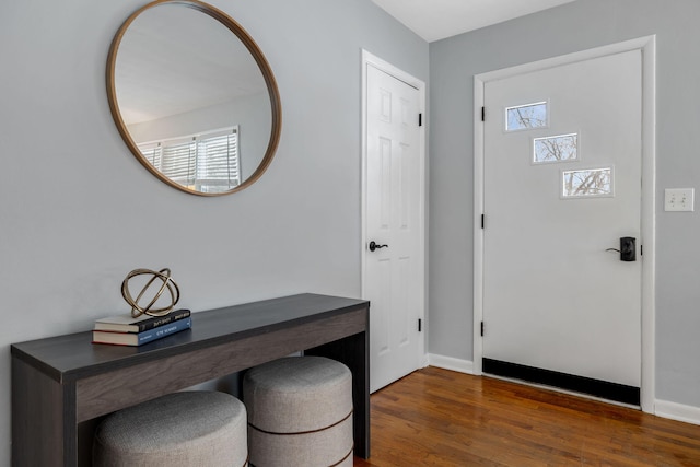 entrance foyer featuring dark hardwood / wood-style floors