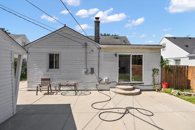 rear view of property with a patio