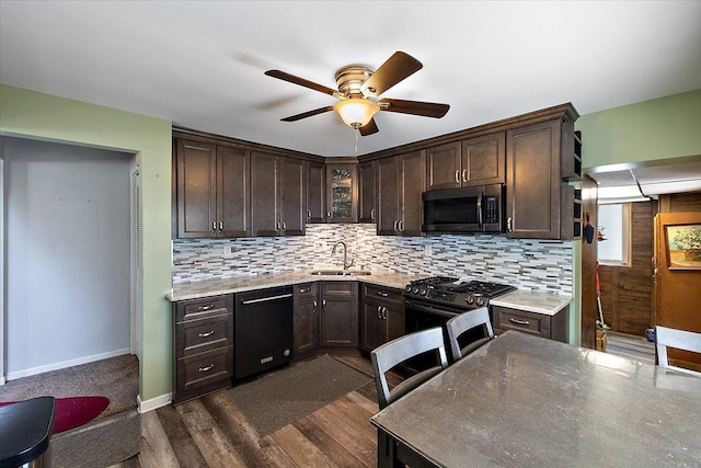 kitchen with ceiling fan, stainless steel appliances, dark brown cabinets, and sink