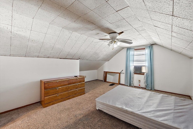 bedroom with ceiling fan, cooling unit, carpet floors, and lofted ceiling