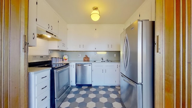 kitchen featuring white cabinets and stainless steel appliances