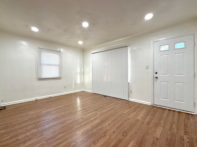 foyer entrance featuring hardwood / wood-style flooring