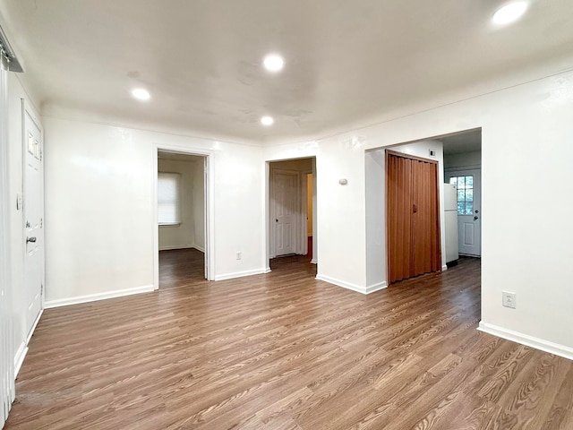 spare room featuring light wood-type flooring