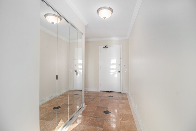 foyer featuring crown molding