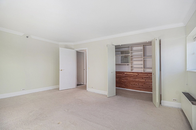 unfurnished bedroom with light colored carpet, radiator heating unit, and crown molding