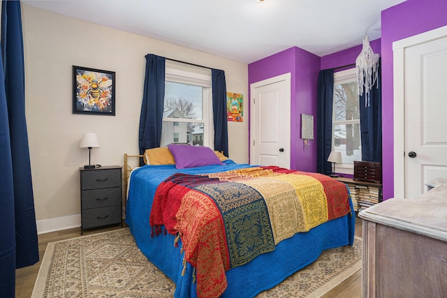 bedroom with wood-type flooring