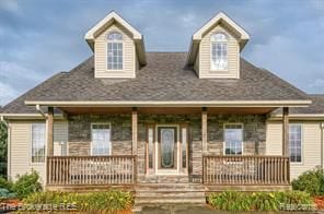 view of front of home featuring covered porch