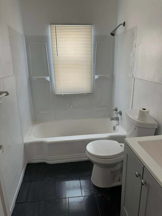 full bathroom with washtub / shower combination, toilet, and vanity