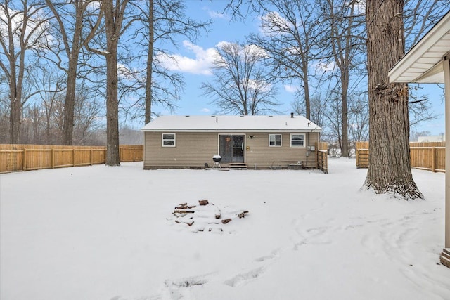 view of snow covered house