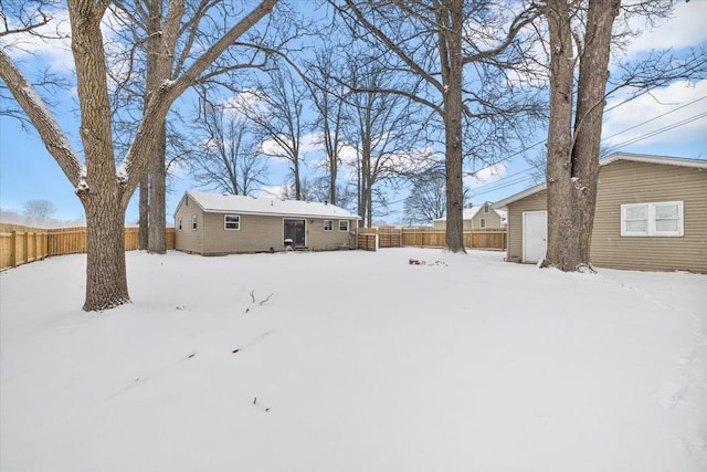 view of yard covered in snow