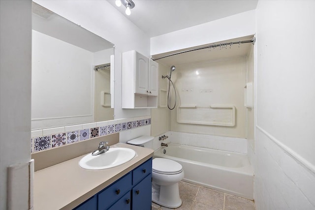 full bathroom with toilet, vanity, tile walls, and shower / tub combination