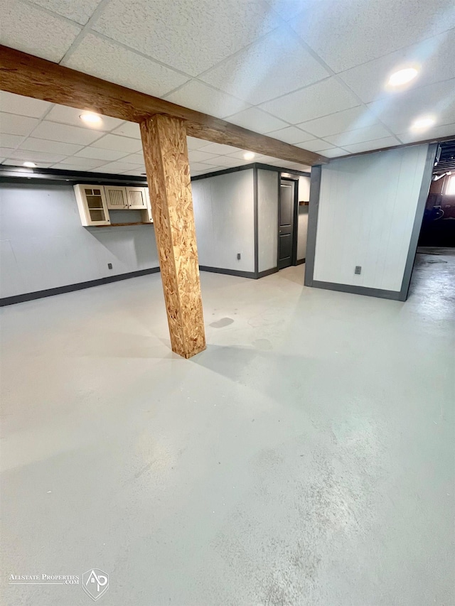 basement with a drop ceiling