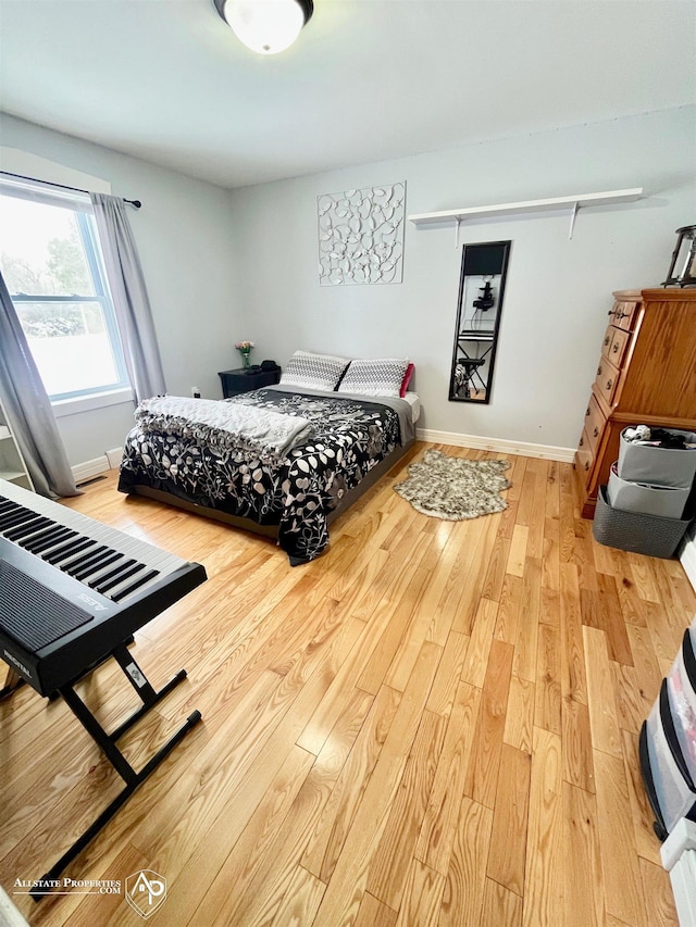 bedroom featuring hardwood / wood-style flooring