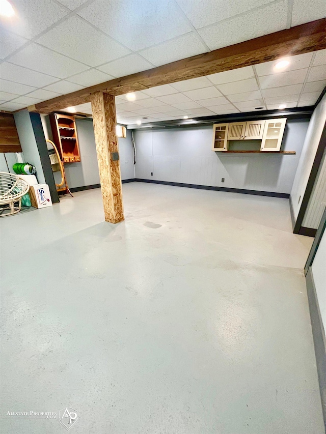 basement with a drop ceiling