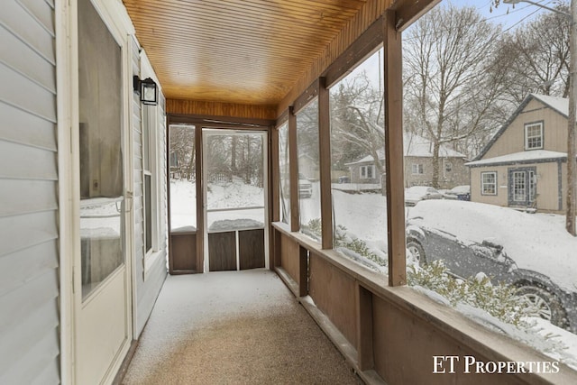 sunroom with wooden ceiling