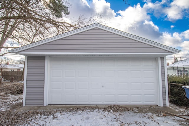 view of snow covered garage