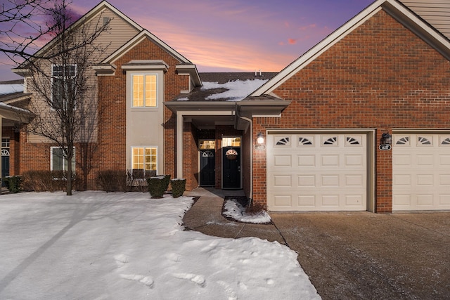 front of property with a garage