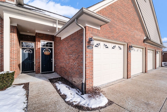 entrance to property featuring a garage