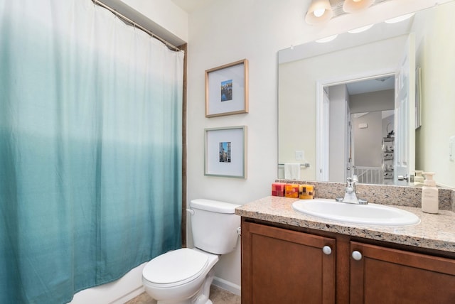 full bathroom with toilet, vanity, and shower / bath combination with curtain