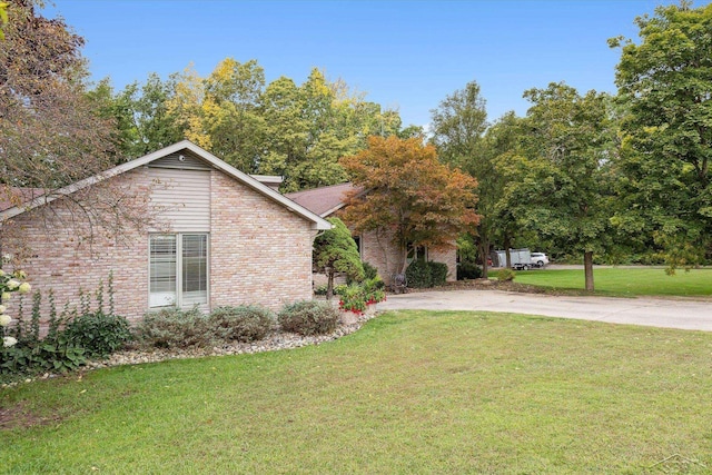 exterior space featuring a front lawn