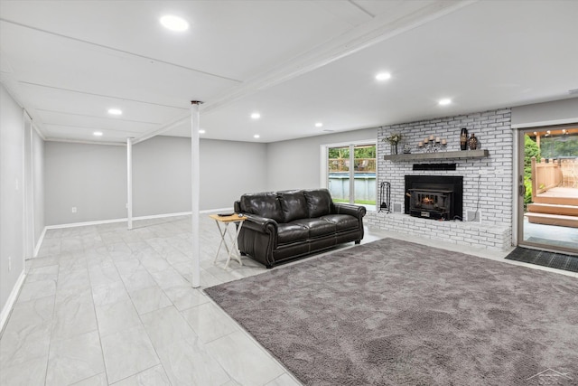 living room with a wood stove