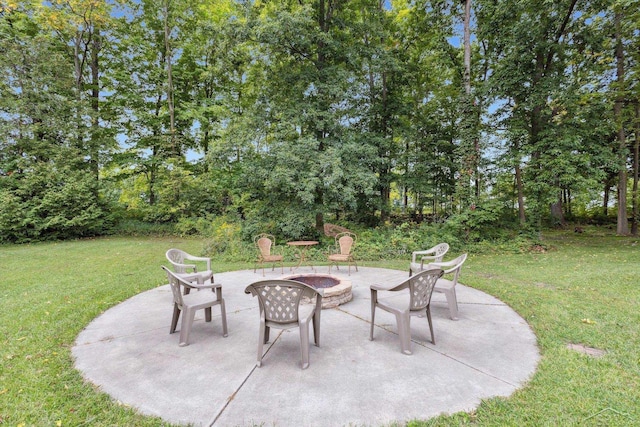 view of patio featuring an outdoor fire pit