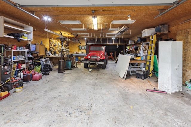 garage with a workshop area