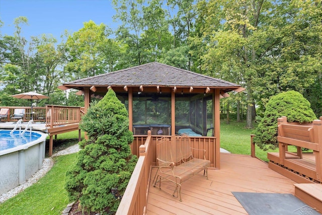 wooden deck with a sunroom