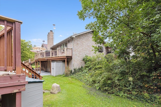 view of yard with a deck