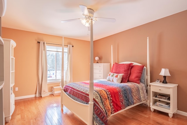 bedroom featuring light wood-type flooring and ceiling fan