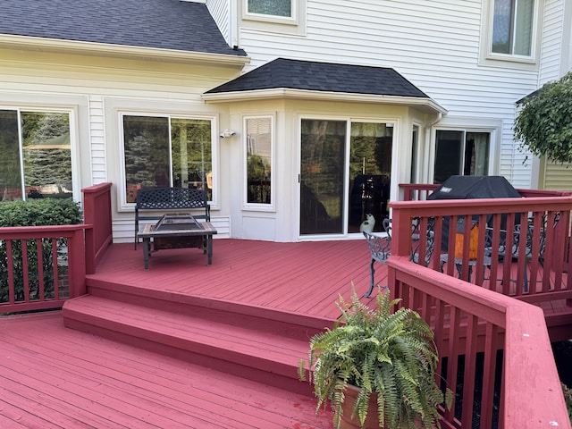 deck with a fire pit