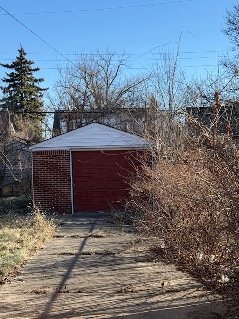 view of outbuilding featuring a garage