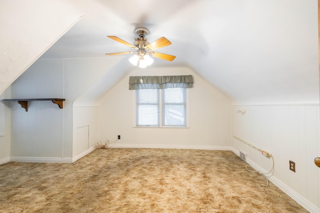 bonus room featuring ceiling fan, carpet, and vaulted ceiling