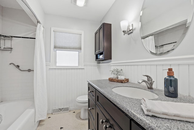 full bathroom with toilet, vanity, tile patterned floors, and shower / bathtub combination with curtain