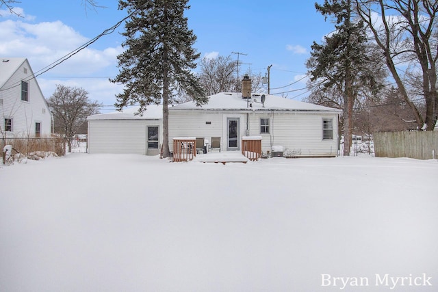 view of snow covered property