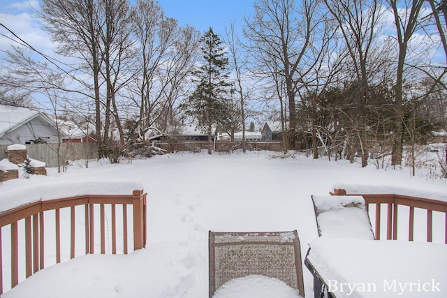 view of yard covered in snow