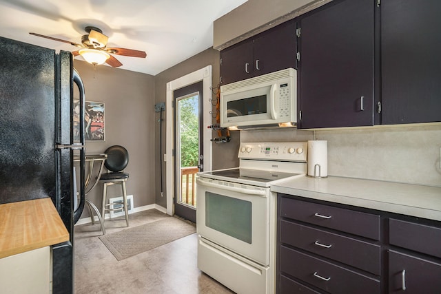 kitchen featuring ceiling fan and white appliances