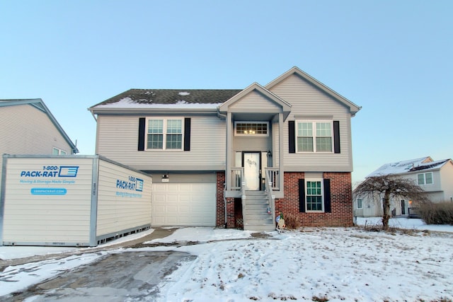 view of front of property featuring a garage