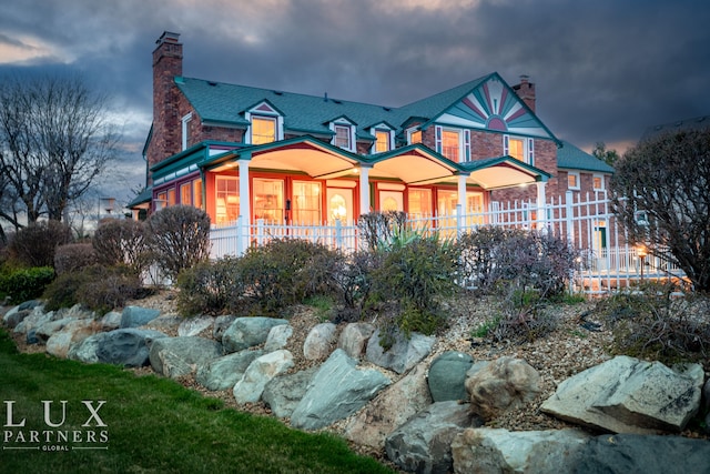 victorian-style house with covered porch