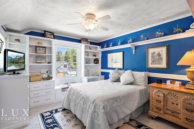 bedroom featuring crown molding, vaulted ceiling, and ceiling fan